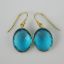 Wholesale Bezel Gemstone Oval Pendant Earrings - Gold Plated Hooks - Blue Quartz