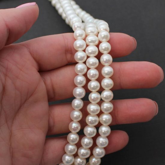 Wholesale White Freshwater Pearl Off Round 7-8mm Beads (1 strand)