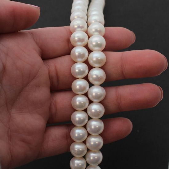Wholesale White Freshwater Pearl Off Round 9.5-10.5mm Beads (1 strand)
