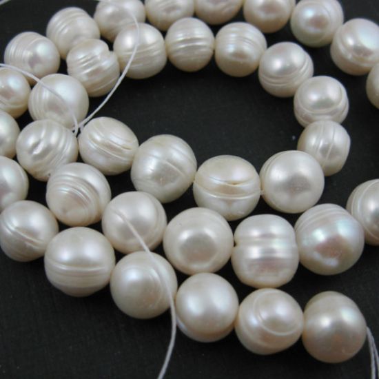 Wholesale Creamy Colored Freshwater Pearls, 10-11mm Round Shape with Rings - June Birthstone (Sold Per Strand)