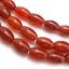Wholesale Reddish Brown Jade Beads - 12mm Smooth Long Oval (Sold Per Strand)