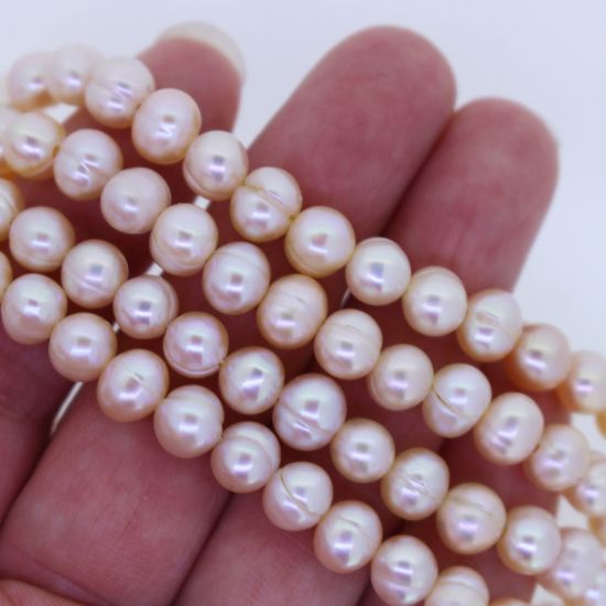 Wholesale Freshwater Pearl Beads 5.5-6mm Off Round Pink Color (Sold Per Strand)